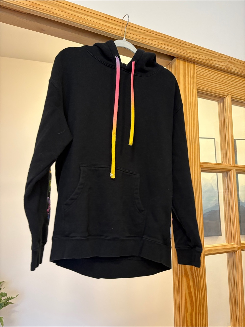 Pink Dolphin Black Hoodie with Gradient Pink to Yellow Drawstrings